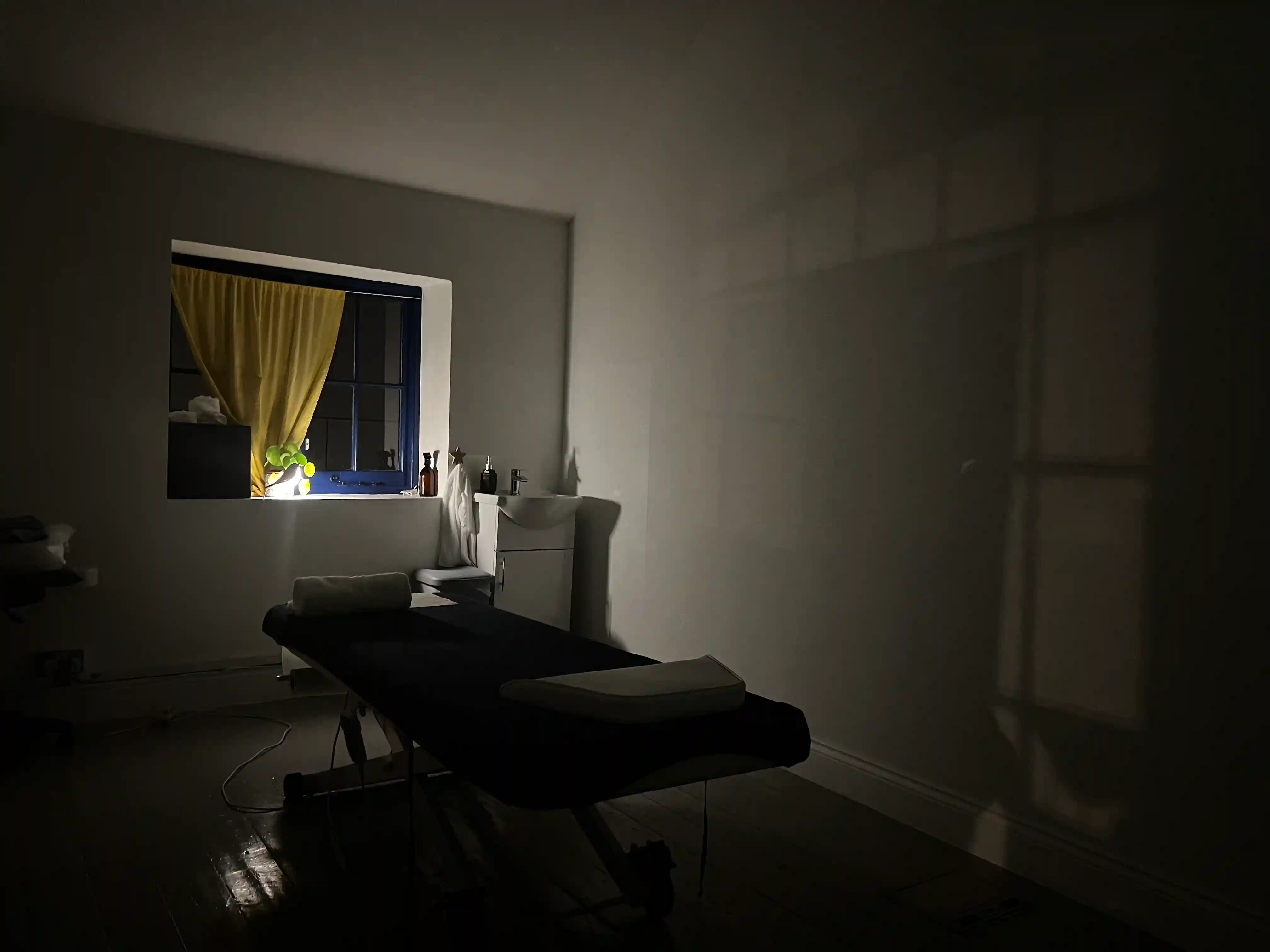 mobile massage table set up in living room